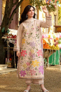 Woman wearing a floral embroidered outfit in an outdoor setting with colorful decorations.