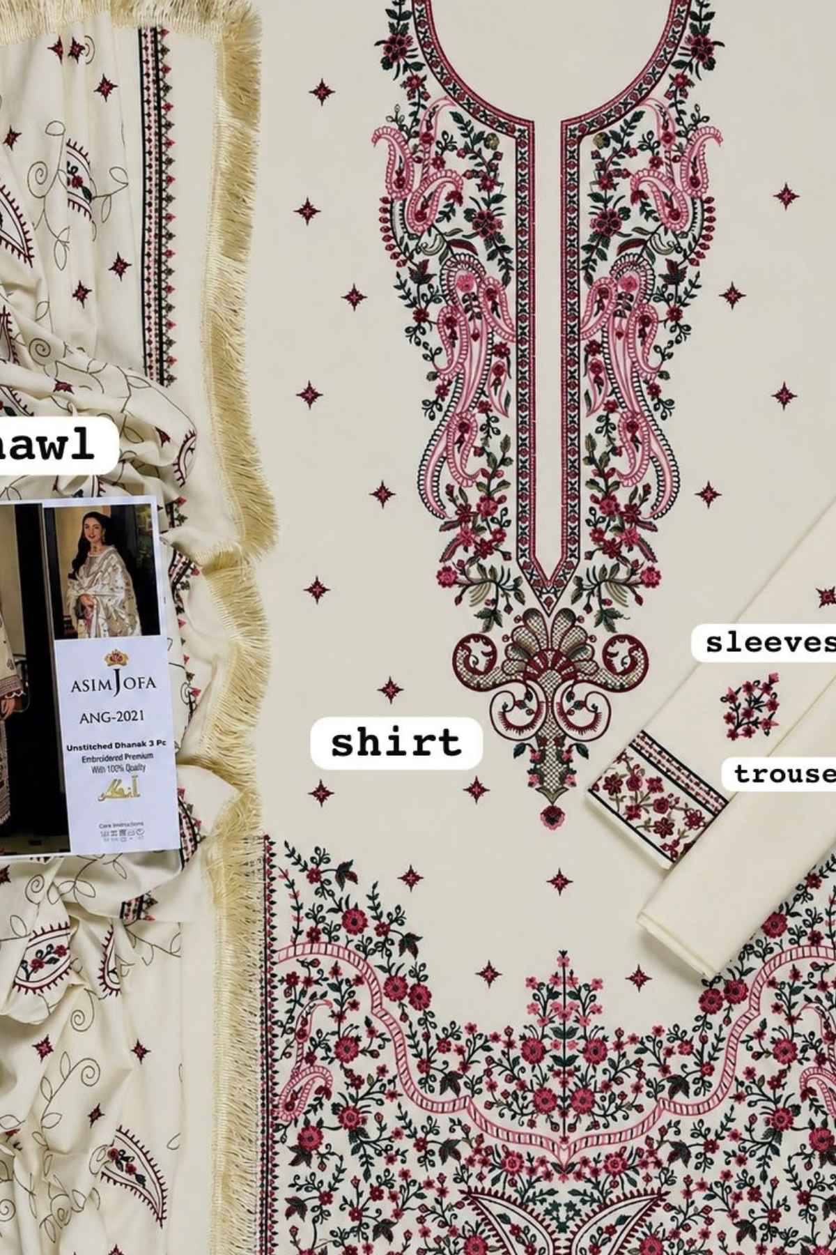 An off-white embroidered traditional outfit laid flat, showing a shirt front with pink and dark green floral embroidery, matching sleeve and trouser embroidery, and a coordinating fringed dupatta. Text labels point to shirt, sleeves, and trouser.