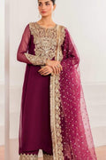 A woman models a deep purple traditional outfit with intricate gold embroidery on the neckline, sleeves, and border, paired with a matching sheer embroidered dupatta.